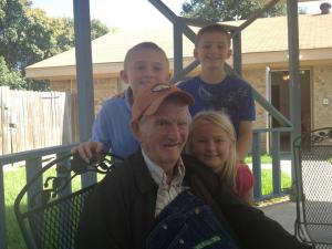 My father with a set of his great-grandchildren